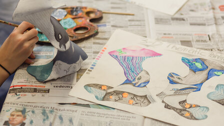 Underwater world painting with whale, dolphin and shells.
